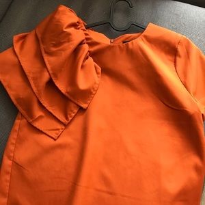 Orange ont welfth ruffle blouse, size large